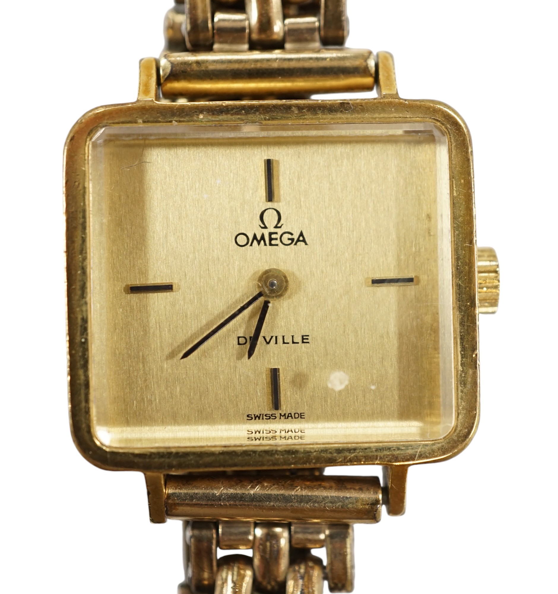 A lady's steel and gold plated Omega De Ville manual wind wrist watch, on an associated gold plated bracelet. Condition - poor to fair